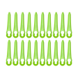Set of green plastic tools with holes on a white background