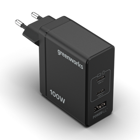 Black power adapter with multiple USB ports and 'greenworks' branding on a white background